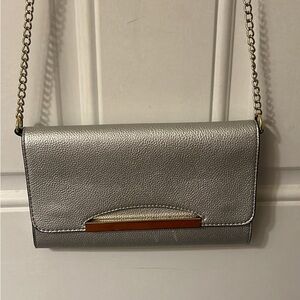 Formal silver clutch